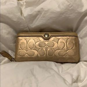 Coach gold accordion zip wallet